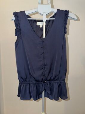 Criss Cross Navy Sleeveless Ruffle-Trim Peplum Blouse